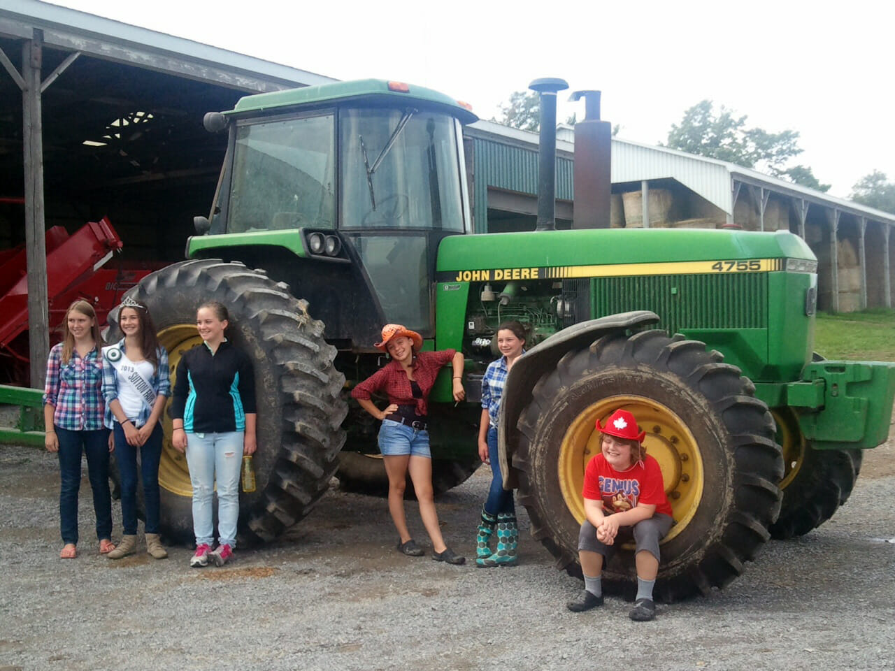 Year Of The Tactor - L-R-Junior Ambassador participant- Deanna Pegg, 2013 Junior Ambassador Emma McDonald, Junior Ambassador participants Maddy Grossi, Hailey Barns, Emily Cryderman and Grant Williams celebrating year of the tractor.